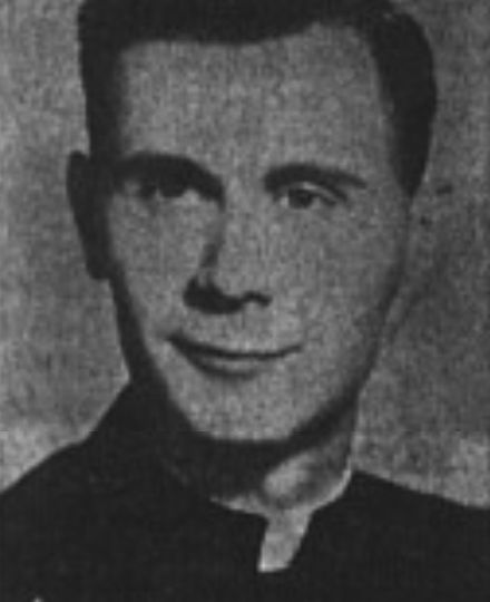 John E Komar